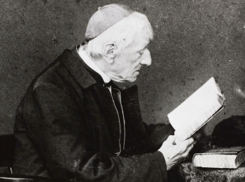 St. John Henry Newman Reading at his Desk